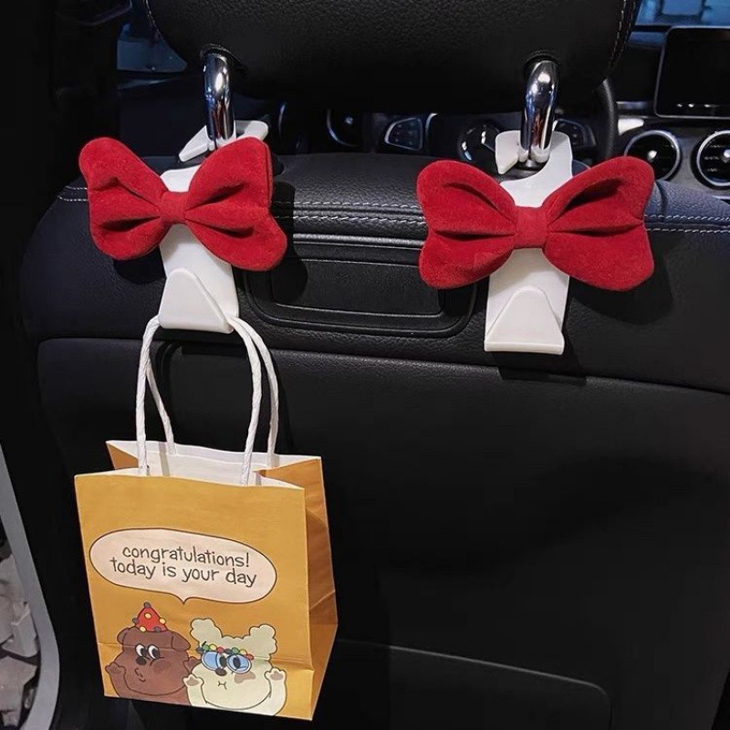 Gancho trasero del asiento del coche de celebridades de Internet Gancho trasero del coche Gancho de almacenamiento trasero del coche Gancho de lazo rojo femenino