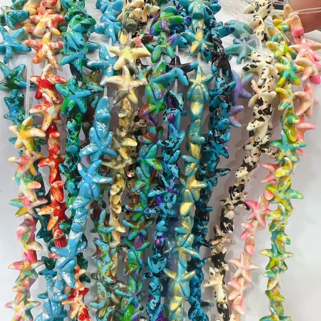 Ventas transfronterizas de coloridas estrellas de mar de piedra de pino cuentas semiacabadas DIY accesorios accesorios materiales de joyería hecha a mano
