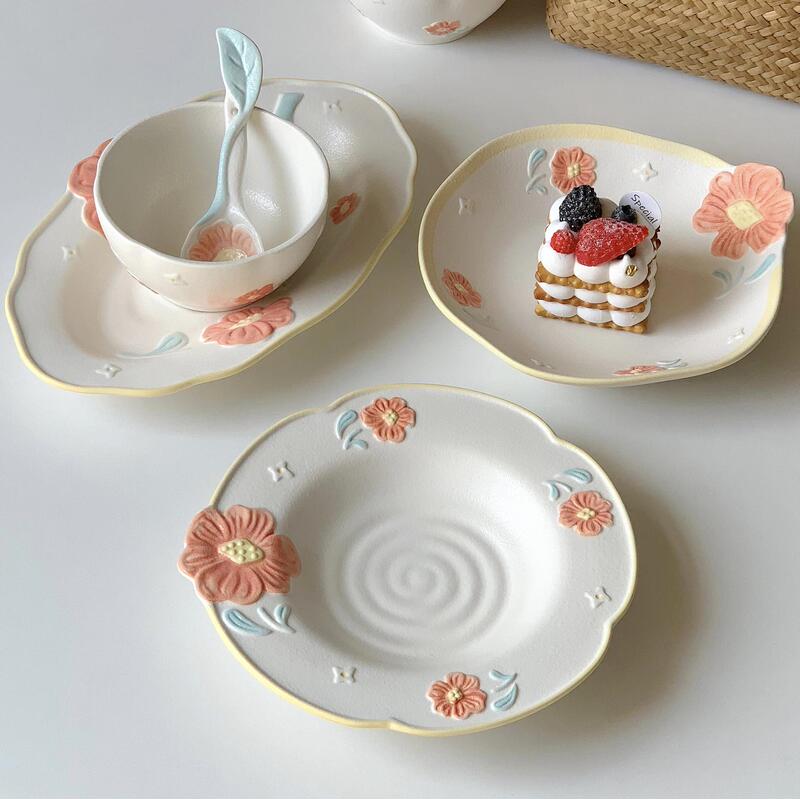 Ins-style underglaze ceramic bowl with embossed floral design, a high-quality and creative bowl and plate set, featuring adorable ceramic rice bowls and yogurt bowls