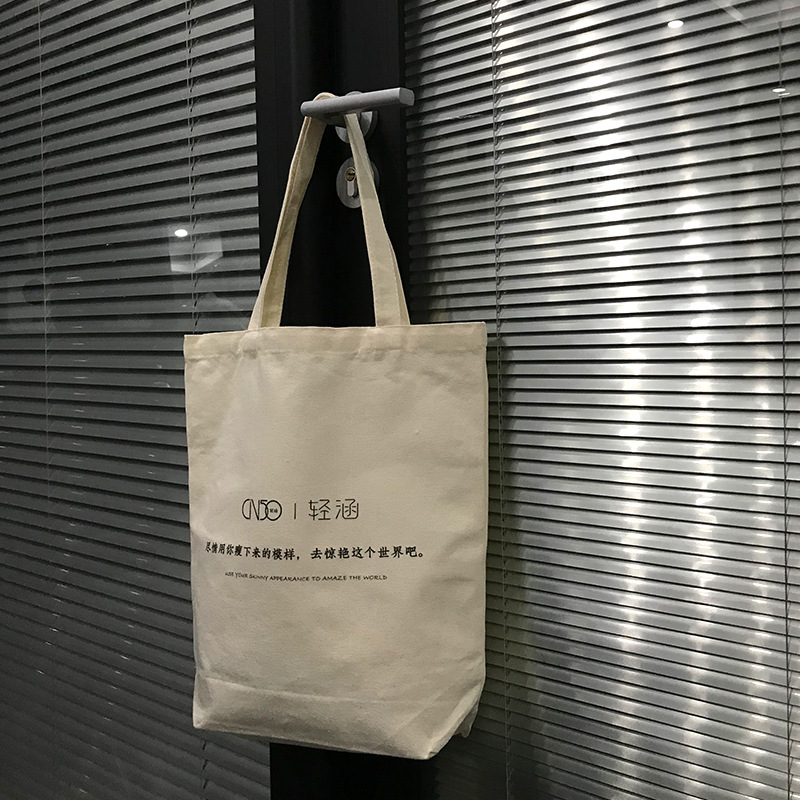 Bolsa de lona al por mayor en blanco en stock DIY pintada a mano graffiti producción bolsa de lona blanca portátil hombro logotipo personalizado