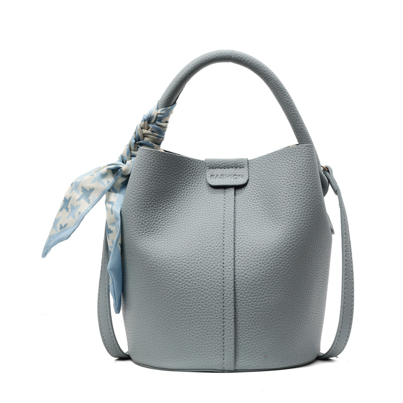 Bolso de cubo portátil de todo fósforo de moda de alta gama para mujer 2025 nuevo estilo bolso de mensajero de hombro simple casual simple