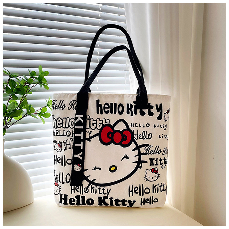 The new fashionable cartoon canvas bag, simple and versatile tote bag, cute commuting single-shoulder tote large bag, is selling well across borders undefined