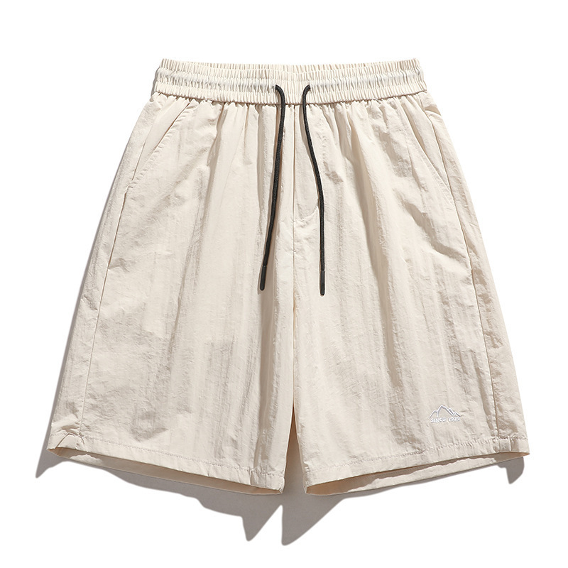 Pantalones cortos de paracaidista de secado rápido al aire libre de la NASA Pantalones cortos de cinco puntos deportivos casuales de moda sueltos de verano americano para hombres Pantalones cortos transpirables