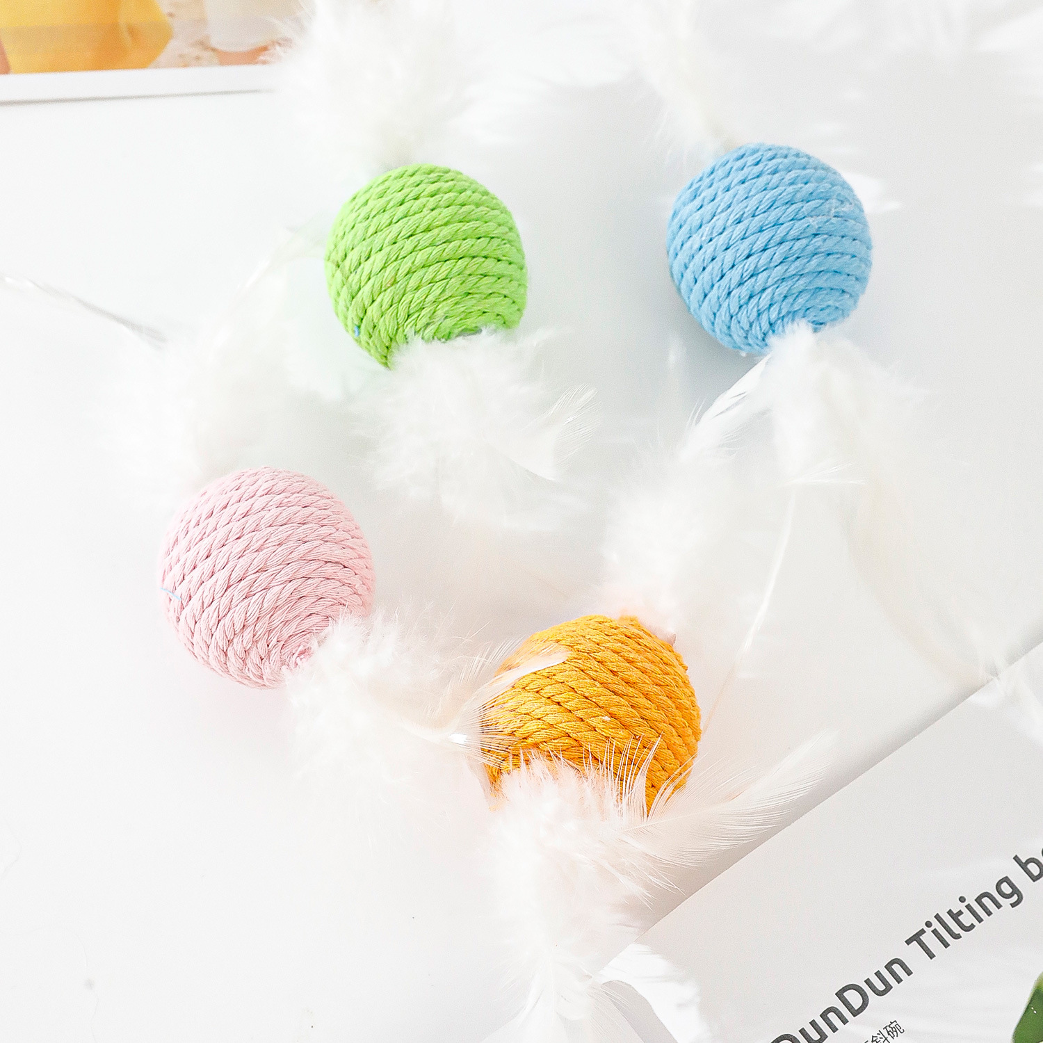 Venta al por mayor Macarons Serie de cuerda de algodón Juguetes para gatos Pelota de juguete para mascotas Cuerda de algodón Bola tejida Juguete para gatos