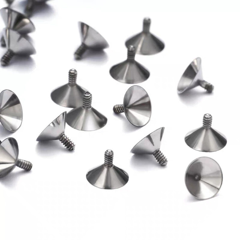 Silver pointed spike labret stud material detail