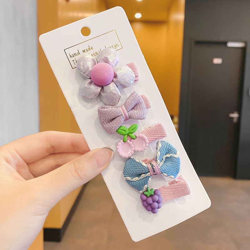 Cinco flores moradas