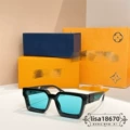 Black frame light blue lenses letter temples