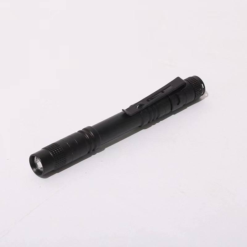 Mini linterna transfronteriza portátil fuerte luz AA batería seca pluma clip de luz regalo luz aleación de aluminio linterna pupila Luz