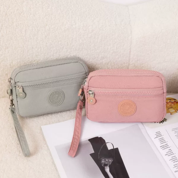 Factory direct foreign trade mobile phone coin purse new cross-border two pull half nylon foreign trade mobile phone coin purse wholesale