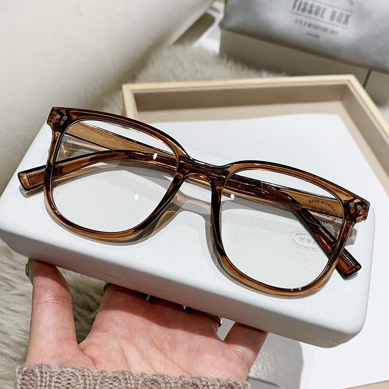 Nuevo Marco de uñas de color beige gafas de luz anti-azul artefacto de belleza liso marco grande que adelgaza versátiles hombres y mujeres gafas de luz anti-azul
