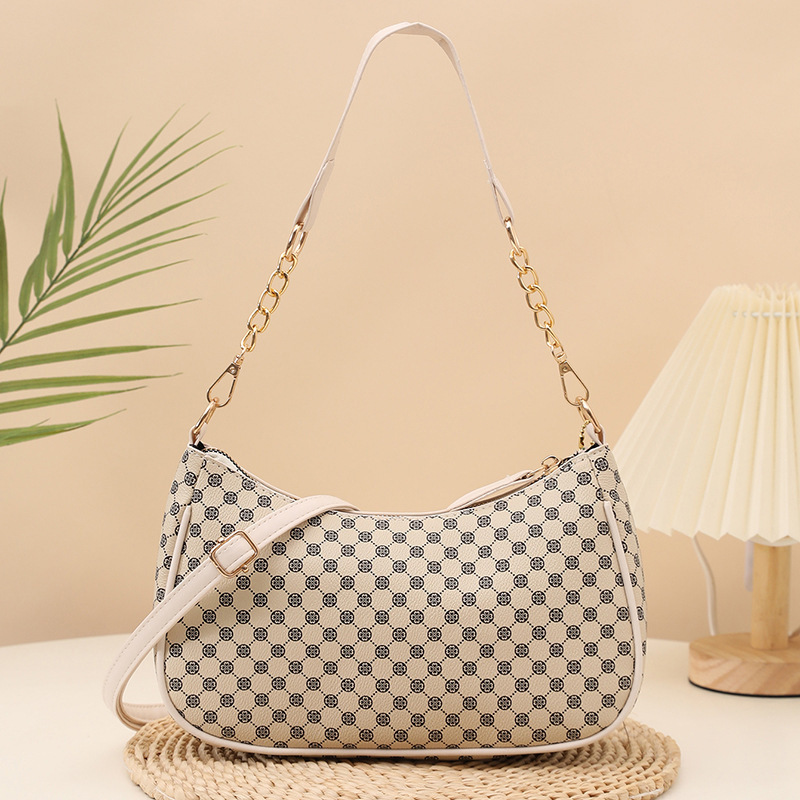 2025 nuevo bolso de mujer nuevo bolso de impresión personalidad bolso de hombro de moda bolso de maquillaje de viaje al comercio exterior lote