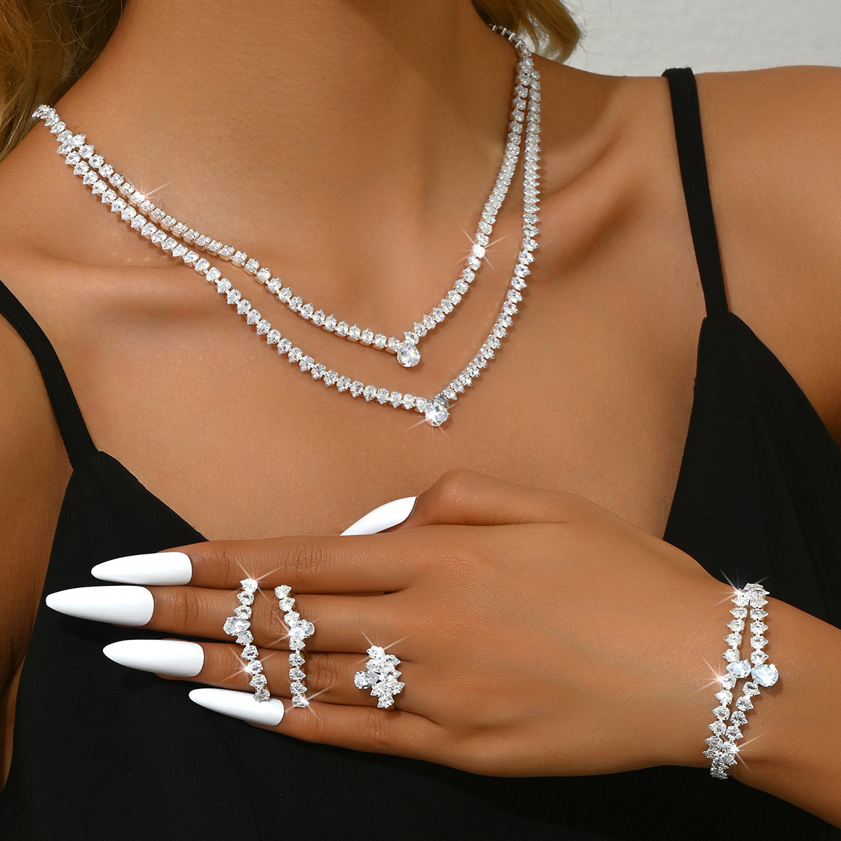 Conjunto de joyería transfronterizo Cadena de garra de circón Moda simple Accesorios de alta gama Pendientes Pendientes Collar Accesorios femeninos al por mayor