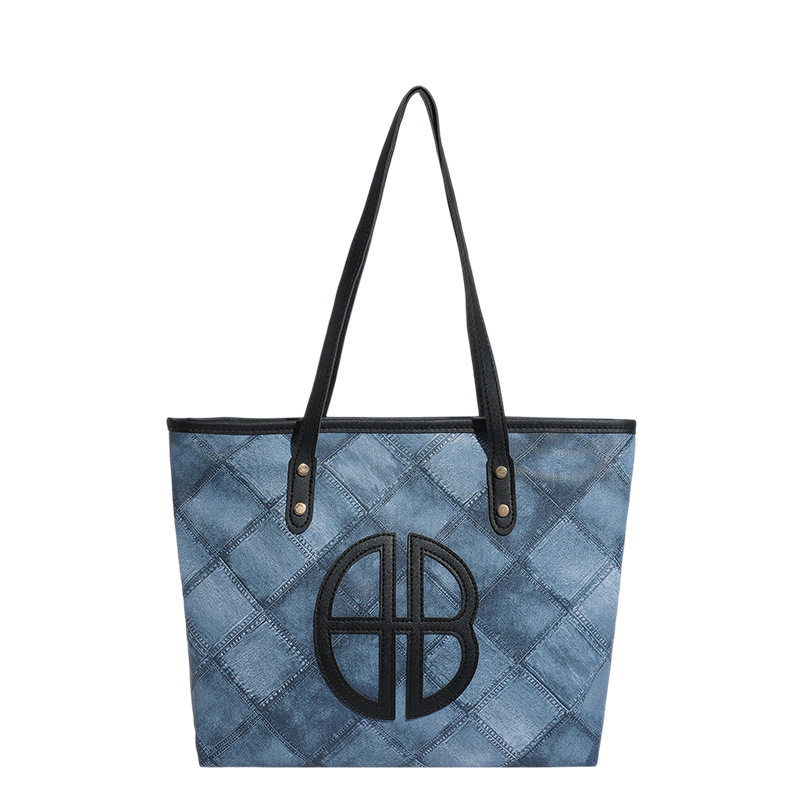Colores contrastantes empalmados bolsos de gran capacidad para mujeres 2025 nuevo retro versátil viaje bolsos de hombro bolsos de moda debajo de la axila
