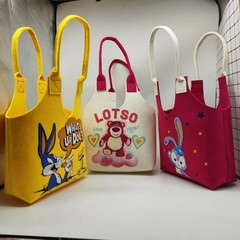 新商品のネットの赤い漫画の学生のハンドバッグの超萌えの漫画のかわいいウサギのフェルトは満月の満1歳の袋の補習の袋を包みます。