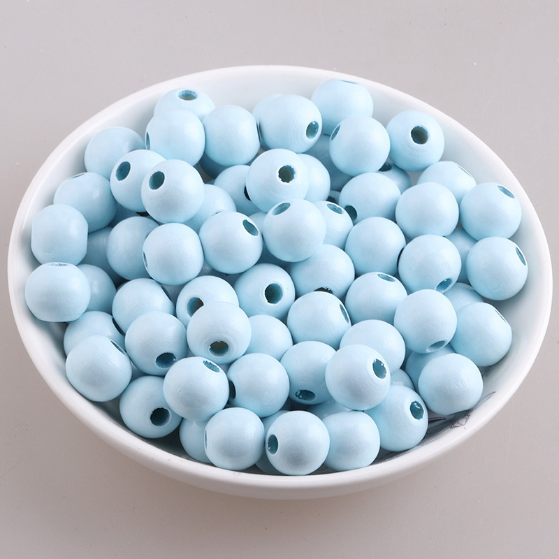 Accesorios de joyería de bricolaje color loto cuentas redondas de madera color caramelo cuentas de madera macarons cuentas de madera al por mayor