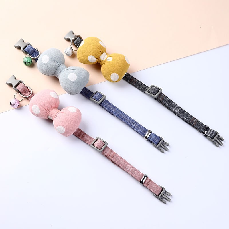 Nuevo collar de mascota al por mayor tirando lindo arco de dibujos animados collar de campana collar de gato suministros para perros pequeños