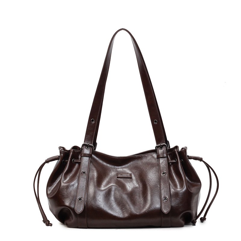 Bolso de gran capacidad para mujeres 2025, nuevo cross-border retro mochila de hombro de textura superior, bolsa de transporte de ocio