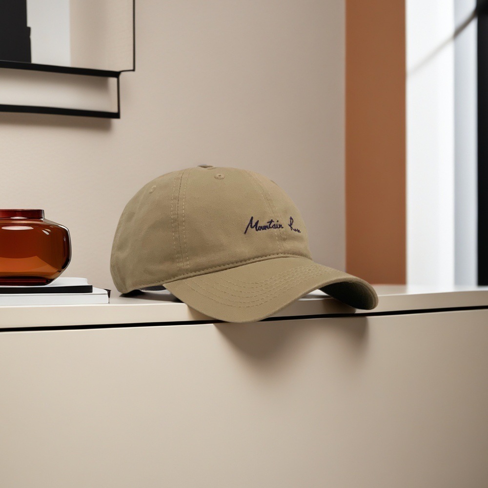 Sombrero de béisbol de estilo japonés original minimalista para hombres y mujeres ociosos con una cabeza grande para mostrar la cara con una gorra de lengua de pato protectora contra el sol.