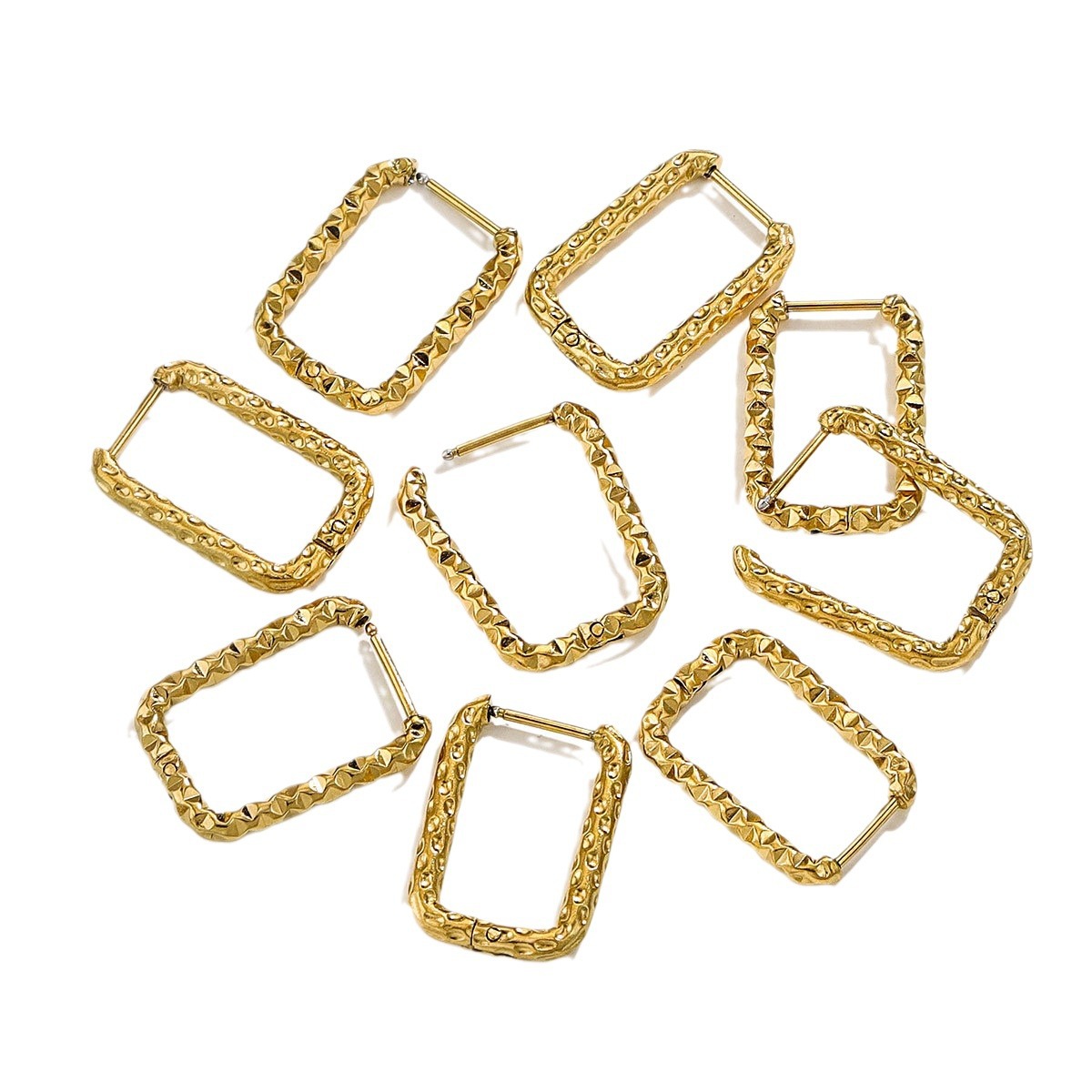 Estilo coreano nuevo estilo ins nicho rectángulo patrón de martillo irregular aretes de acero de titanio de personalidad de moda de alta gama