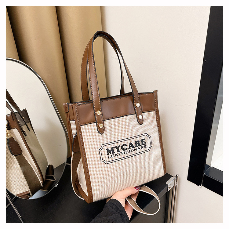 Nuevo cross-border bolso de empalme de color para mujeres 2025 verano lienzo de moda mochila de hombro simple bolsa de viaje image 10