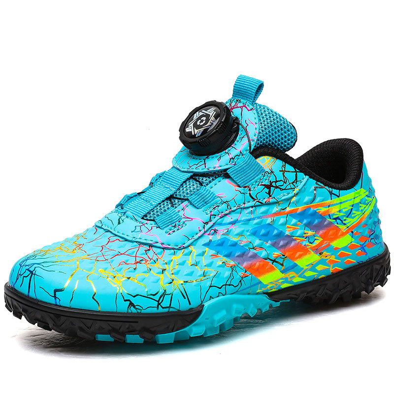 Nuevo botón giratorio sin lazos zapatos de fútbol niños y niñas TF clavos rotos zapatos de fútbol zapatos de entrenamiento