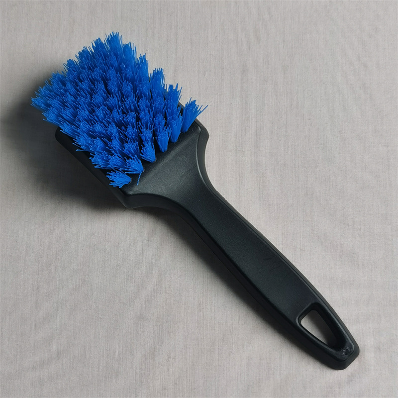 검은 색 손잡이가있는 파란 머리