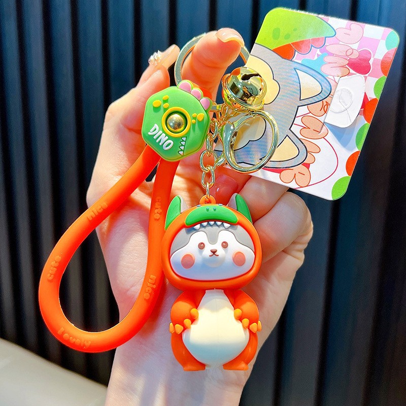 Keychain dinosaurio auténtico lindo bolso colgante de goma blanda llavero de automóvil muñeca pequeña máquina de regalos al por mayor image 29