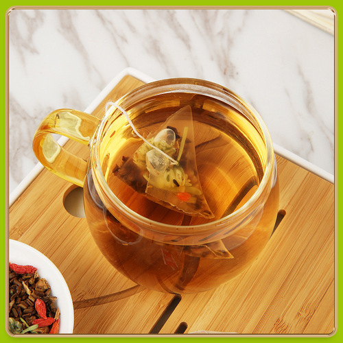 Chrysanthemum Goji Berry Cassia Seed Tea, honeysuckle tea, burdock root osmanthus tea, night owl transparent bag packaging, triangle bag.