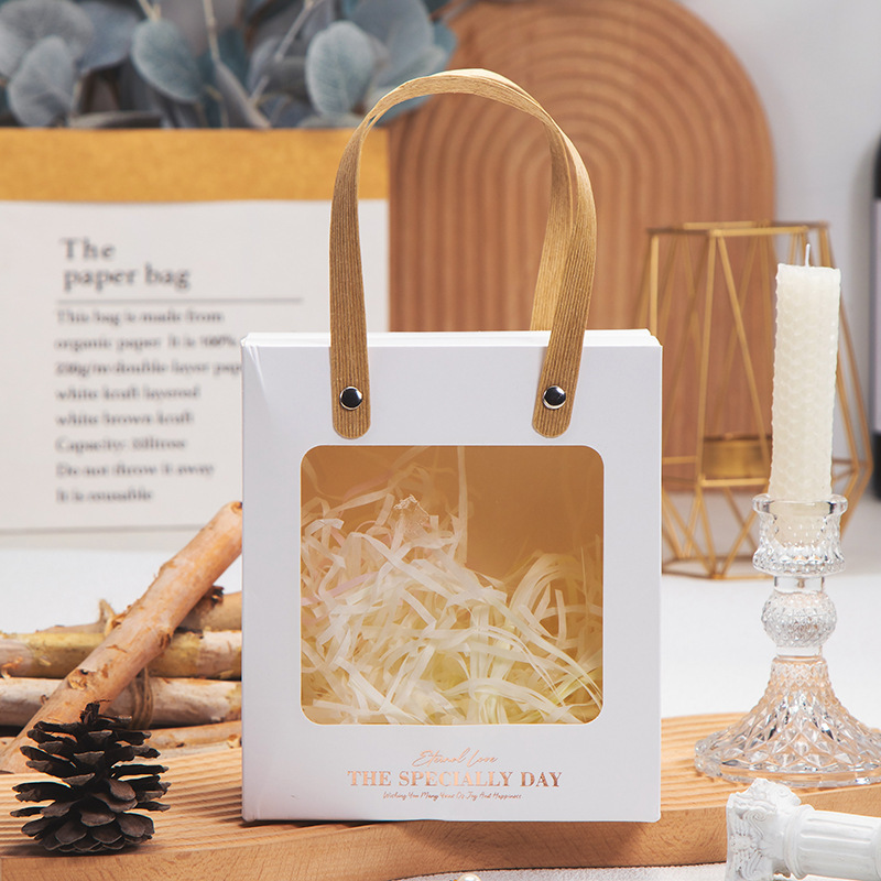 아이보리 상자 리본 또는 라피아