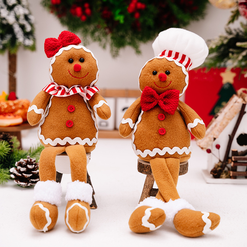 2種類のアマゾンの新しいクリスマスの姜パイ人は足の公仔のクリスマスのビスケット人を掛けてショーウインドーの雰囲気を飾っています。|undefined