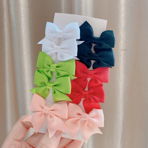 Juego de horquillas con lazo de cola de milano para niños de estilo caliente de Amazon, lindo y versátil, horquilla diaria para niñas europeas y americanas 323