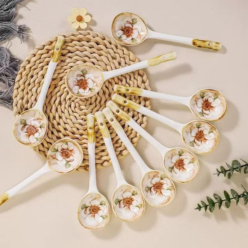 Cuchara de cerámica de color esmaltada cuchara de mango largo cuchara encantadora cuchara de arroz cuchara de arroz cuchara de torsión cuchara de cabeza redonda