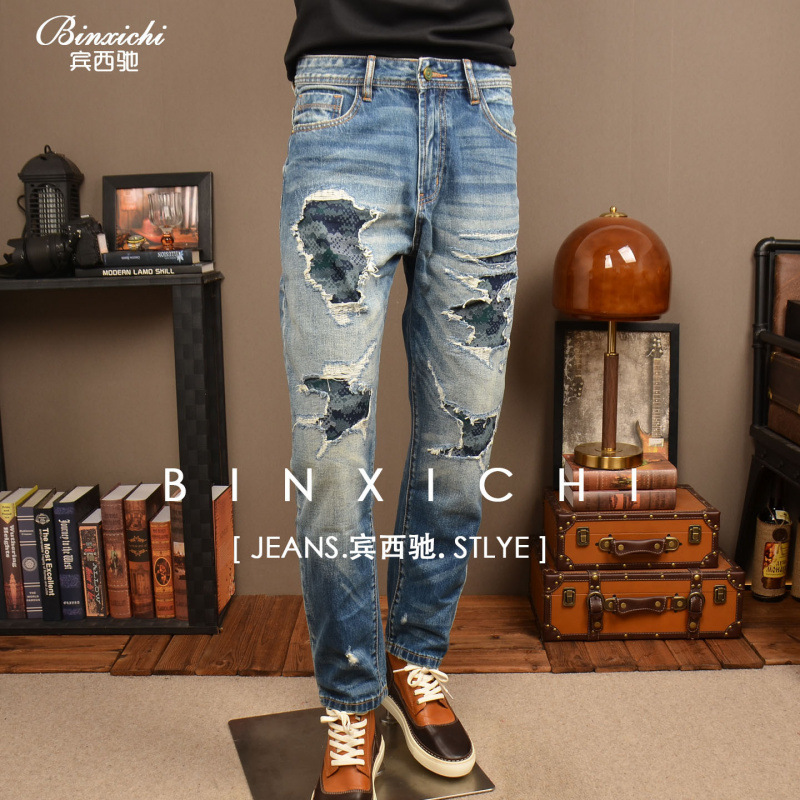 Autumn retro blue ripped loose-fit jeans, a trendy and stylish men's item, featuring patches, and a popular casual wide-leg tapered design for this year Autumn retro blue ripped loose-fit jeans, a trendy and stylish men's item, featuring patches, and a popular casual wide-leg tapered design for this year
