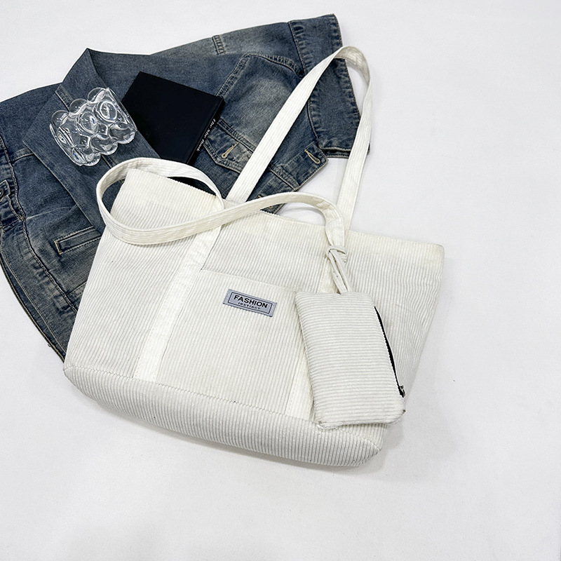 2025 otoño e invierno nueva moda bolso de hombro de pana de gran capacidad bolso de mano fresco estilo japonés bolso grande de pana de color puro para mujer