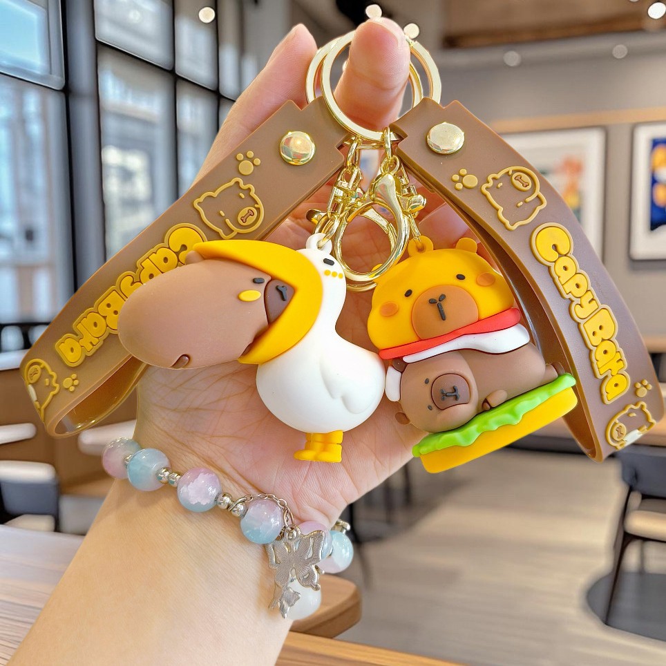 Nuevo llavero de Kapibala pareja mochila escolar colgante lindo capibara muñeca de PVC llavero de coche al por mayor