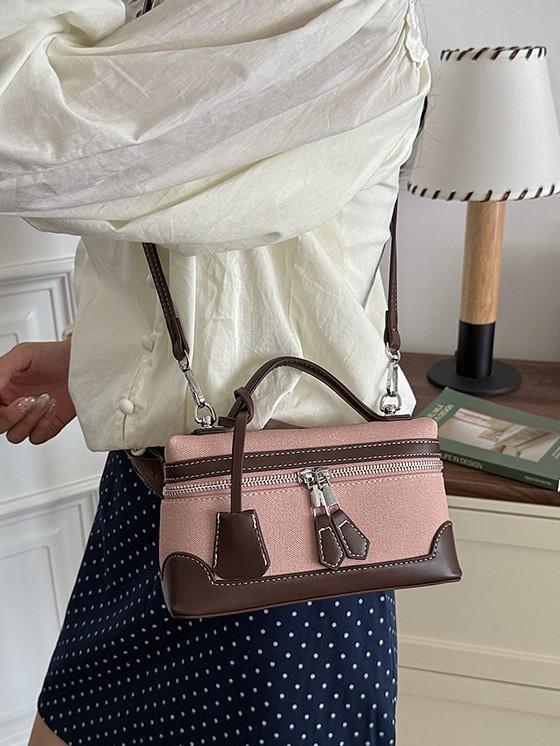 Caja de mano retro europea y americana bolsos pequeños cuadrados de mujeres nuevas ventas calientes transfronterizas pu color de empalme de hombro único bolso de tramo inclinado