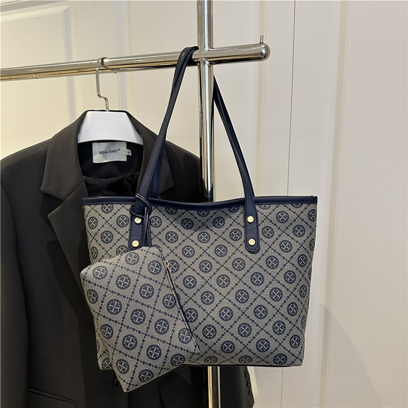 Nicho de diseño de alta sensación 2025 nueva moda versátil gran capacidad de hombro portátil bolso de mano de mujer