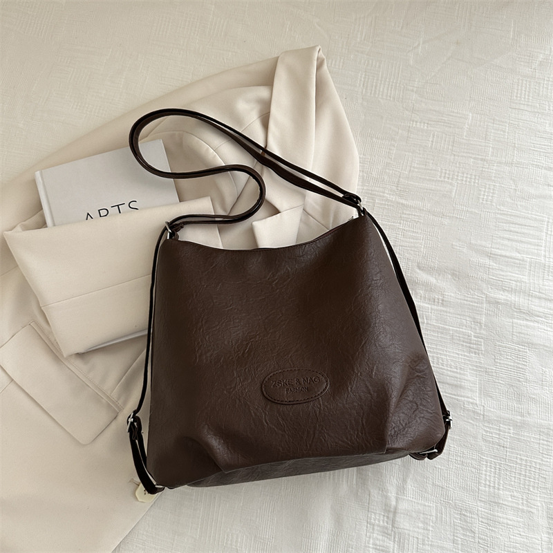 Gran capacidad de transporte popular ocio 2024 retro nuevo estilo de tendencia de color sólido multifuncional bolso de hombro para mujer