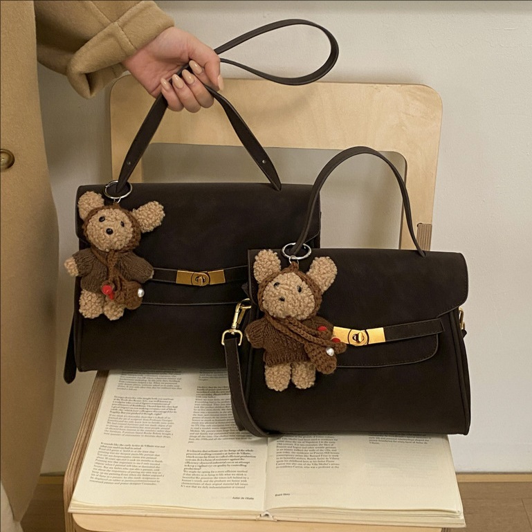Transfronterizo coreano ligero lujoso temperamento bolso pequeño 2026 primavera nuevo estilo de transporte de hombro mochila esmaltado bolso de mano Kelly