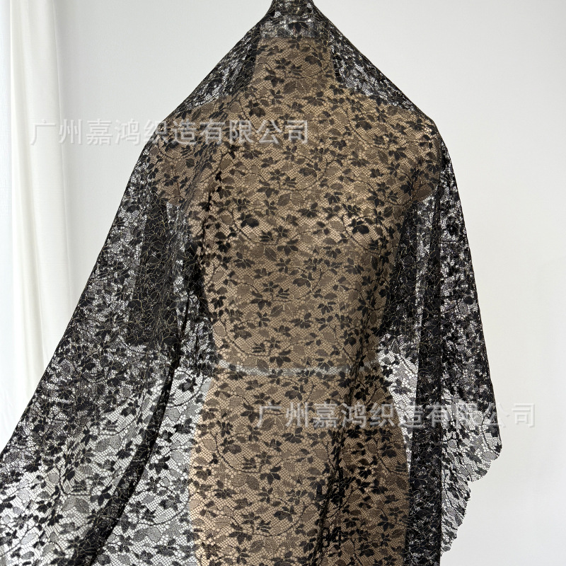 Tejido de encaje de nylon brillante oro francés temperamento de mujer falda flor de encaje fábrica de stock