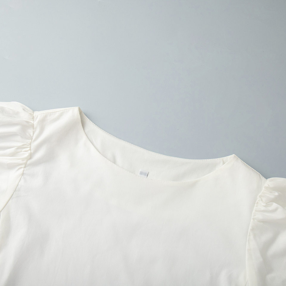 Đầm liền nữ cổ tròn tay phồng cotton dáng rộng màu trơn — Màu trắng chi tiết 10