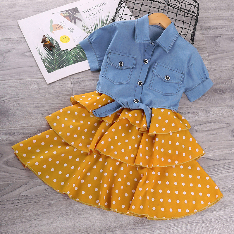 Explosiva ropa de niña transfronteriza 2025 verano para niños nueva chaqueta de mezclilla de manga corta traje de falda de princesa al por mayor