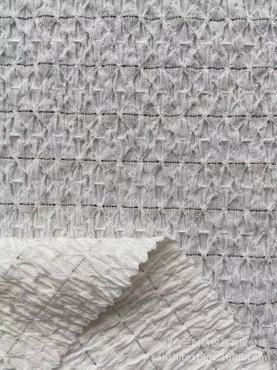 供应针织经编 皱布提花面料 春夏经编凹凸绉布