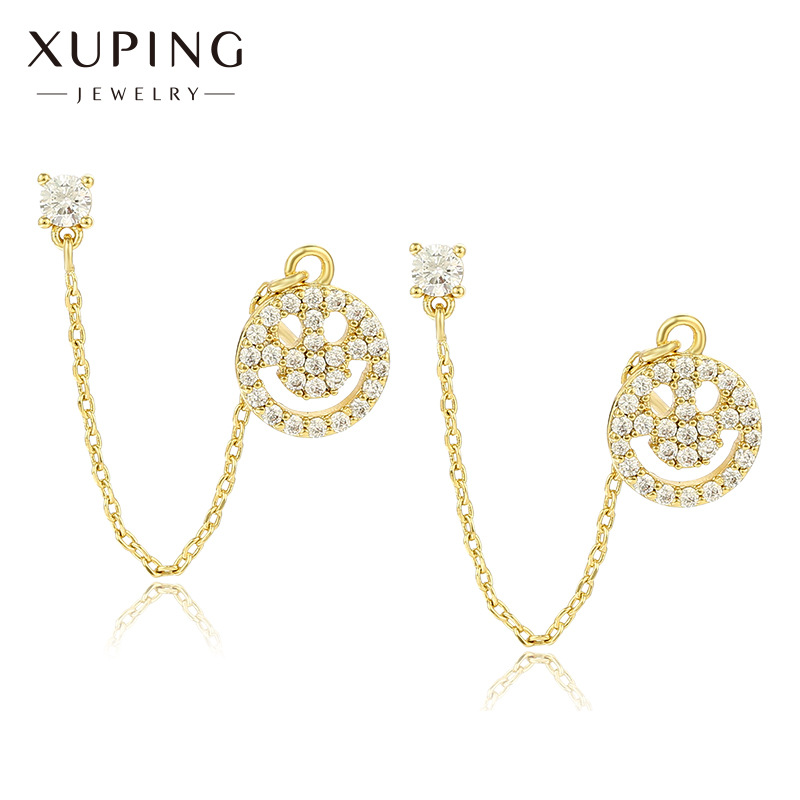 Joyas Xuping personalidad europea y americana sonriente pernos de orejas de aleación nicho ligero lujoso frío orejas de viento para mujeres exquisitas verano