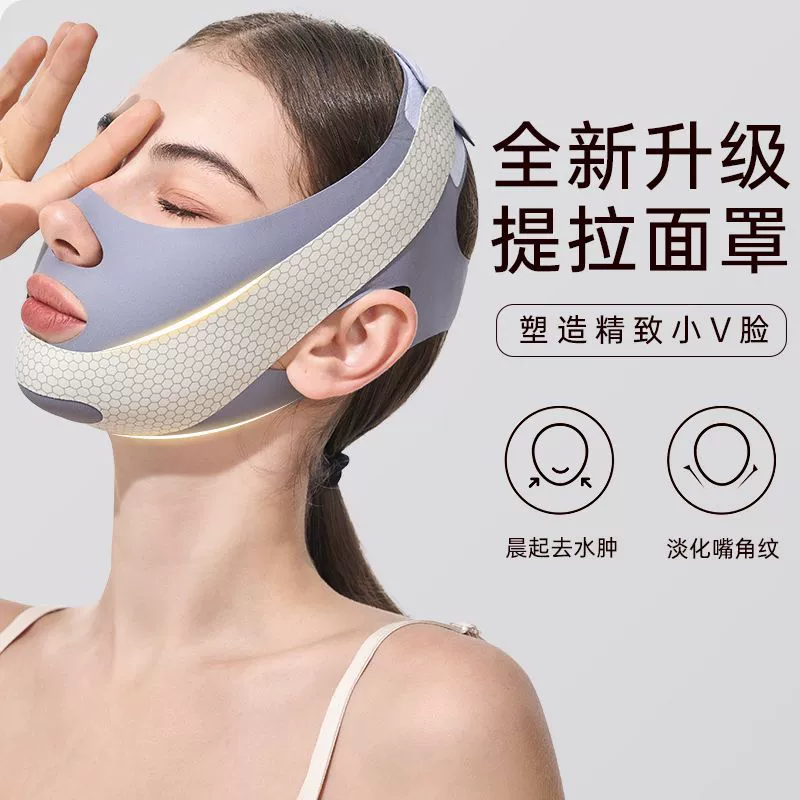 Pulls up elastic bandage, supporting mask for face, removes double chin