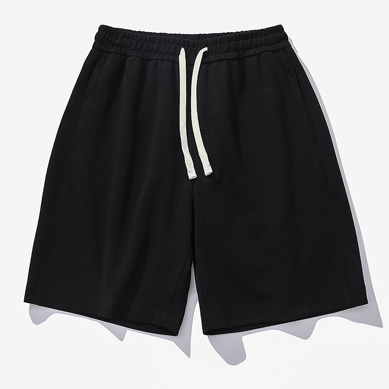 Nuevas tendencias pantalones cortos de cinco puntos de color sólido de verano versión coreana de pantalones deportivos casuales para hombres
