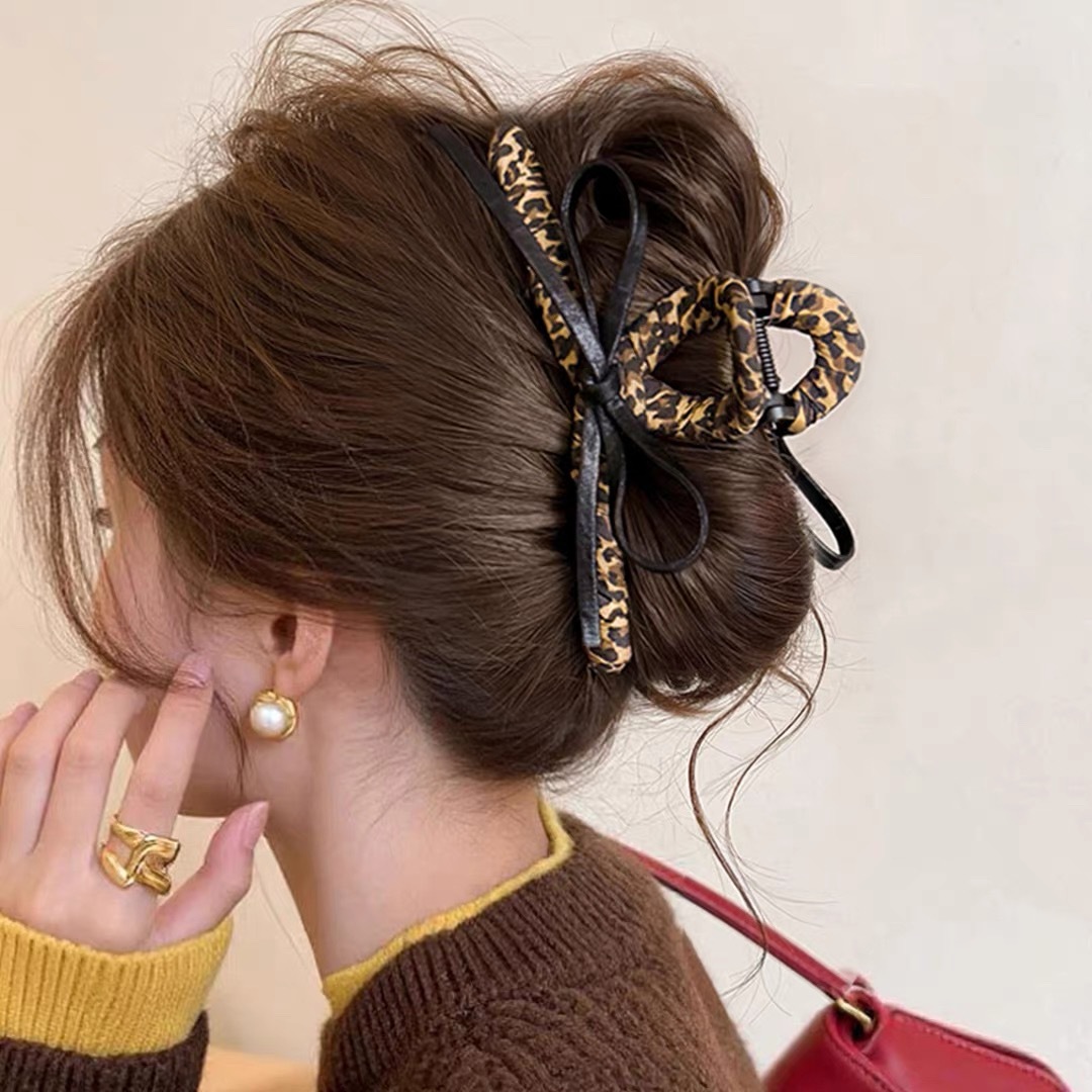 64#Black leather bow with leopard print wrapping, approximately 13cm