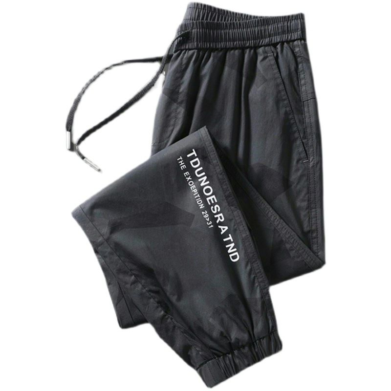 Pantalones de los hombres de verano delgado estilo coreano de moda hasta el tobillo pantalones deportivos casuales pantalones sueltos de camuflaje de los hombres