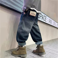 子供服、男の子の秋用パンツ、春と秋の韓国風子供用ジーンズ、ファッショナブルでハンサムなゆったりとしたズボン