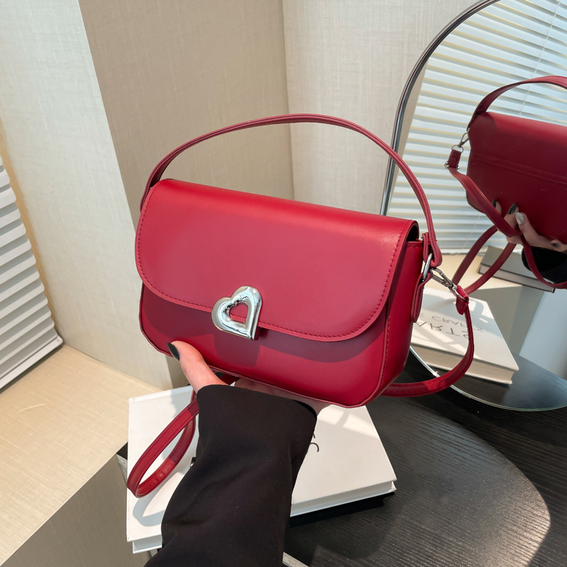 Texturas extranjeras bolsas de mano debajo de las axilas mujeres 2024 invierno nuevo estilo de moda bolsa de silla casuales bolsas de hombro